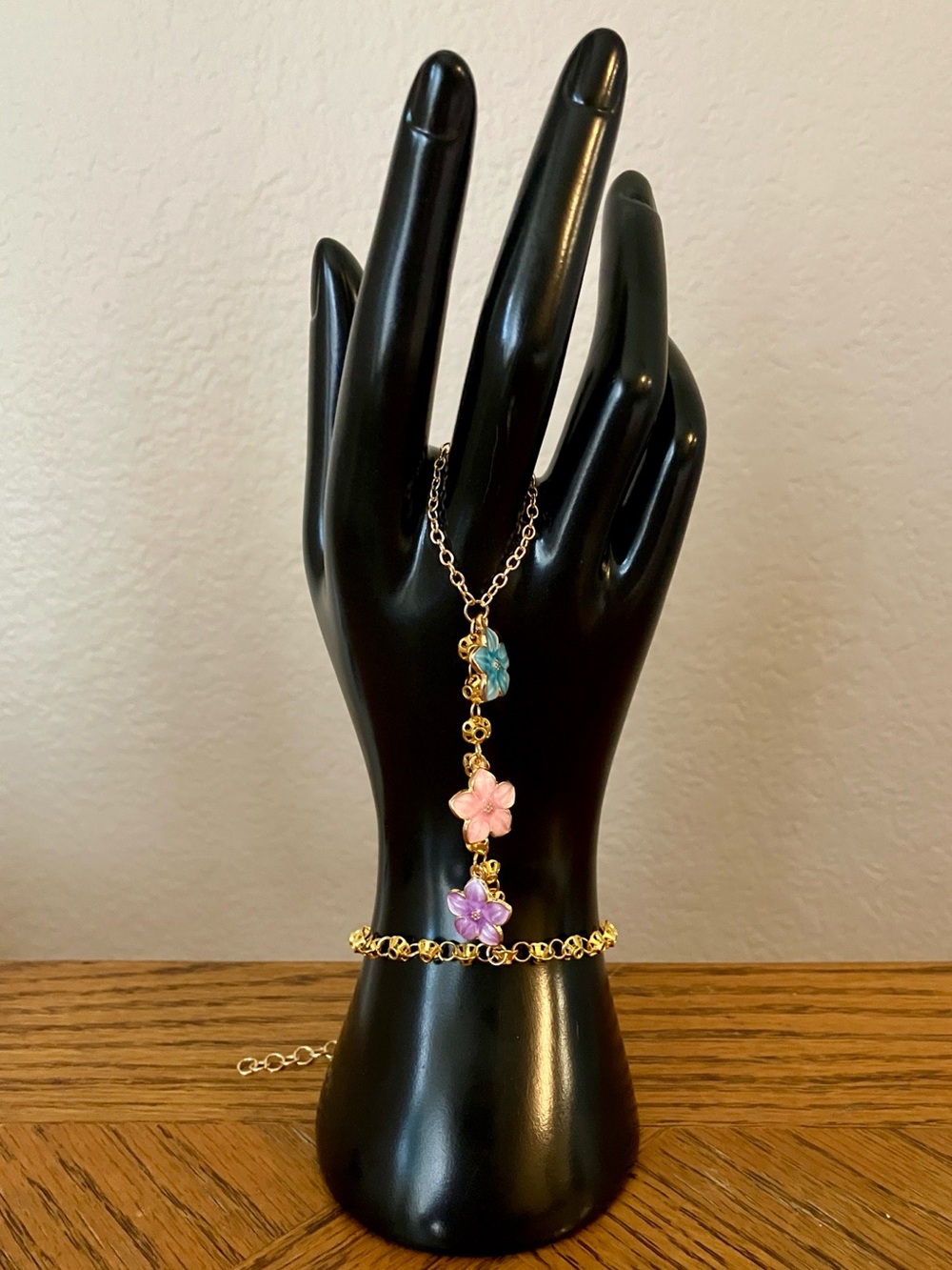 Gold Tone Floral Hand Chain Bracelet